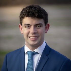 Cody Cook’s headshot.