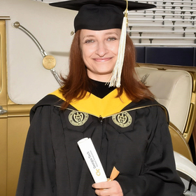 Liudmila Tuzova’s headshot.