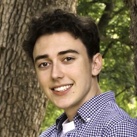 Christopher Roy’s headshot.