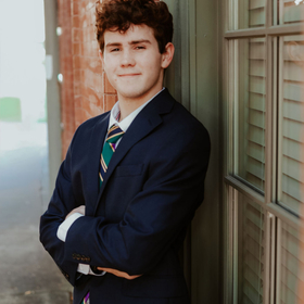 Andrew McAlpine’s headshot.