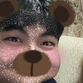 Kap Mang’s headshot.