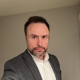 Tyler Susmilch’s headshot.