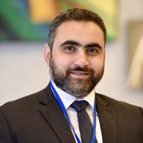 Mohamed Breik’s headshot.