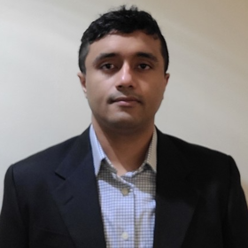 Mathew Thomas’ headshot.