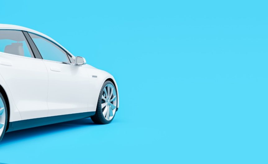 A rear and side view of a white electric vehicle with a charging nozzle connected to its part against a blue background.