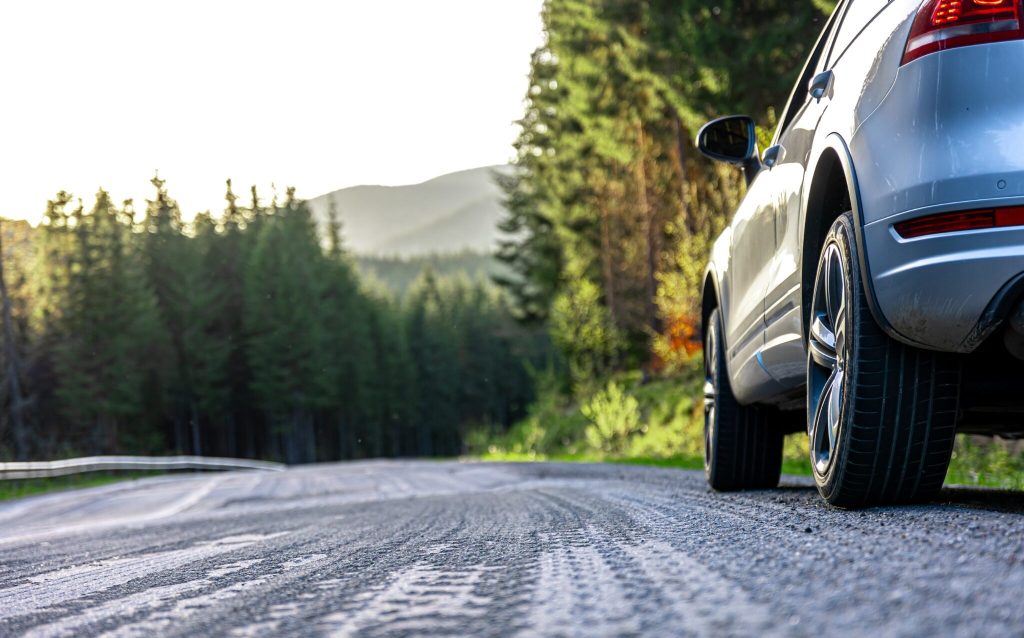 https://s3.amazonaws.com/rnrtires.com/wp-content/uploads/2026/07/30192345/car-on-road-compressed-under-1MB-1024x638.jpg