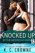 Knocked Up by the Mountain Man: An Enemies to Lover's Romance by K.C. Crowne