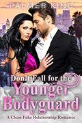 Don't Fall for the Younger Bodyguard: A Clean Fake Relationship Romance (Take My Advice #5) by Palmer King