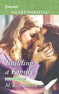 Building a Family (A True North Hero #2) by M.K. Stelmack