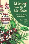 Missing Under The Mistletoe: A Flower Shop Mystery Christmas Novella (A Flower Shop Mystery #19.1) by Kate Collins