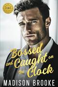 Bossed and Caught on the Clock: An Enemies to Lovers Billionaire Romance by Madison Brooke
