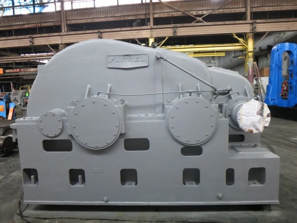 How can regular maintenance help prevent excessive noise in industrial gearboxes?