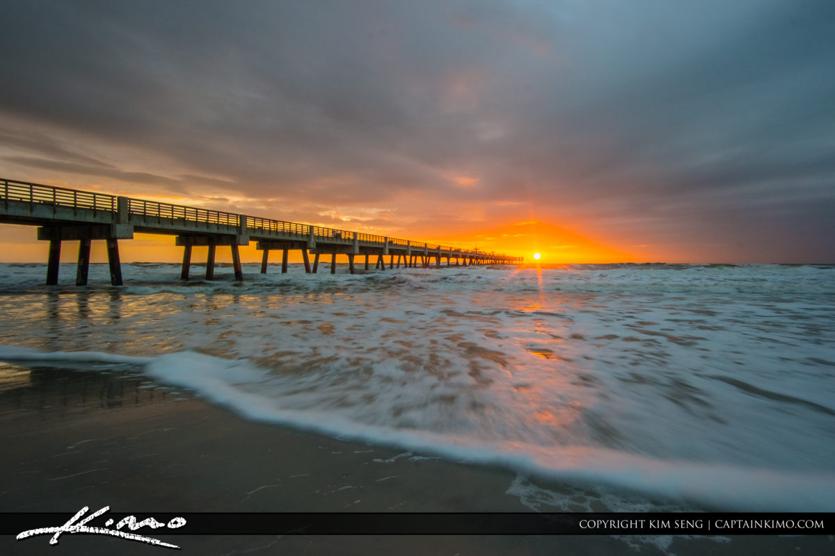 Jacksonville Beach sunburst with ocean wave Royal Stock Photo
