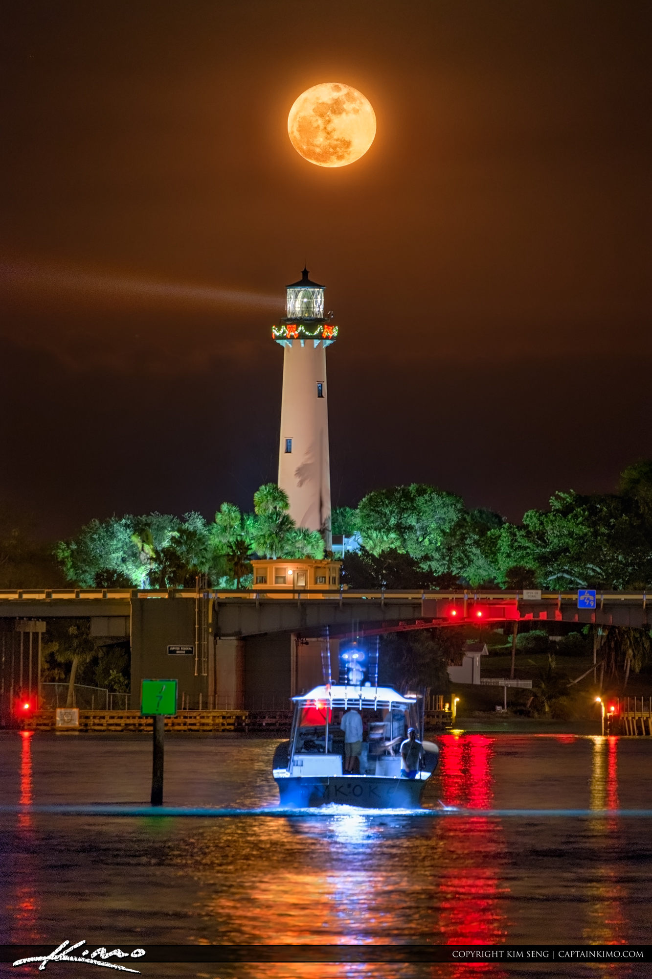 Fishing Boat and Moon Rise Jupiter Inlet Lighthouse Royal Stock Photo