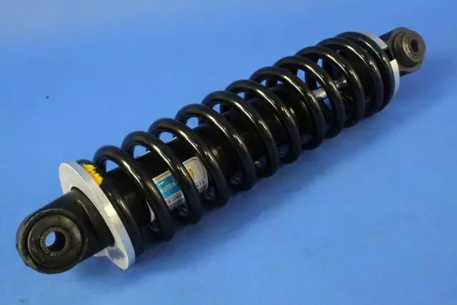 Front Suspension Spring And Shock Assembly