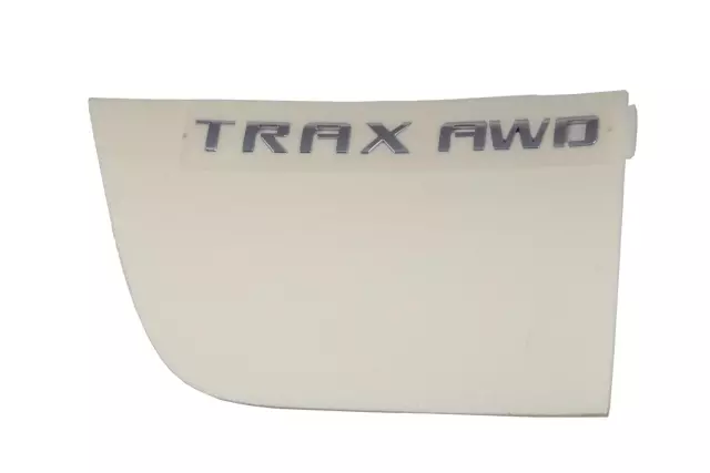 Driver Side Liftgate Trax and AWD Logo