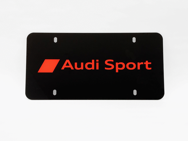 ZAW072850E - Exterior: Polycarbonate Audi Sport Vanity Plate for Audi: A3, A3 Quattro, A3 Sportback e-tron, A4 allroad, A4 Quattro, A5 Quattro, A5 Sportback, A6 allroad, A6 Quattro, A7 Quattro, A7 Sportback, A8 Quattro, allroad, e-tron GT, e-tron Sportback, Q3, Q4 e-tron, Q5, Q5 Sportback, Q7, Q8, R8, RS e-tron GT, RS3, RS5, RS5 Sportback, RS7, S3, S4, S5, S5 Sportback, S6, S7, S8, SQ5, SQ5 Sportback, SQ7, SQ8, TT Quattro, TT RS Quattro, TTS Quattro Image