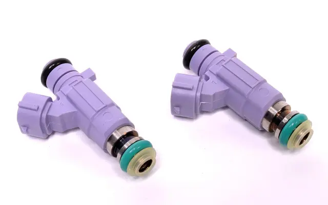 Nismo Purple 480Cc High Top Side Feed Injectors (16600rr710) 1999
