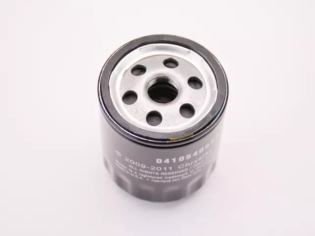 4105409AE - Maintenance &amp; Lubrication: Oil Filter for Chrysler: Cirrus, E Class, Imperial, Laser, LeBaron, New Yorker, PT Cruiser, Sebring, TC Maserati, Town &amp; Country, Voyager | Dodge: 600, Aries, B150, B250, B350, Caravan, Charger, D100, D150, D250, Dakota, Daytona, Dynasty, Grand Caravan, Lancer, Mini Ram, Neon, Omni, Rampage, Shadow, Spirit, Stratus, W100, W150 | Jeep: Liberty, Wrangler Image