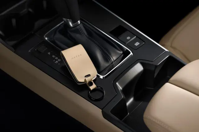 C9N4-V0-450 - Leather Key Fob Cover - Tan 2026 Mazda CX-5 | Mazda