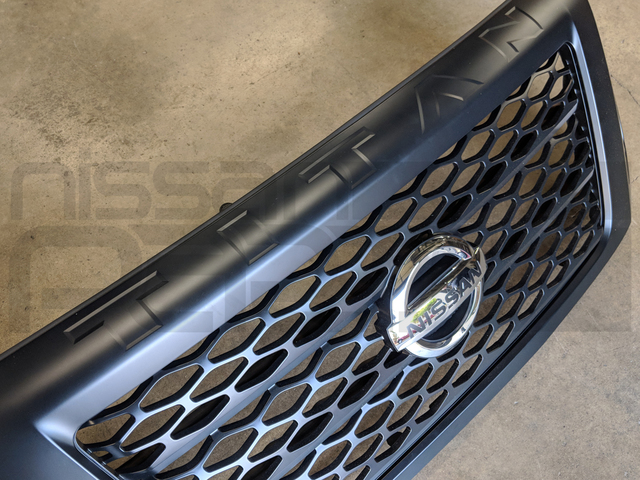 Genuine Grille Assembly - 62310-EZ55D | NissanParts.cc | Nissan