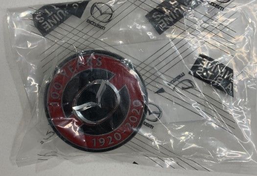 DJ15-37-190 - 100th anniversary center cap | Mazda Parts Factor