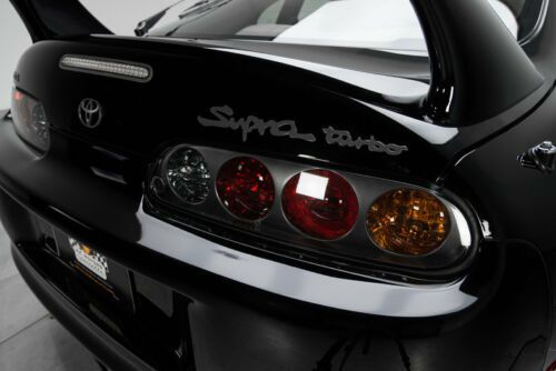 thumbnail image 2 of NEW OEM Toyota Supra JZA80 1997-1998 Black Tail Light Set (2PC) W/ Harness 2 of 3