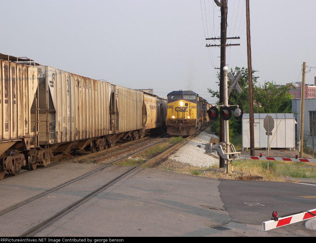 CSX 145 about to leave when the grain train clears