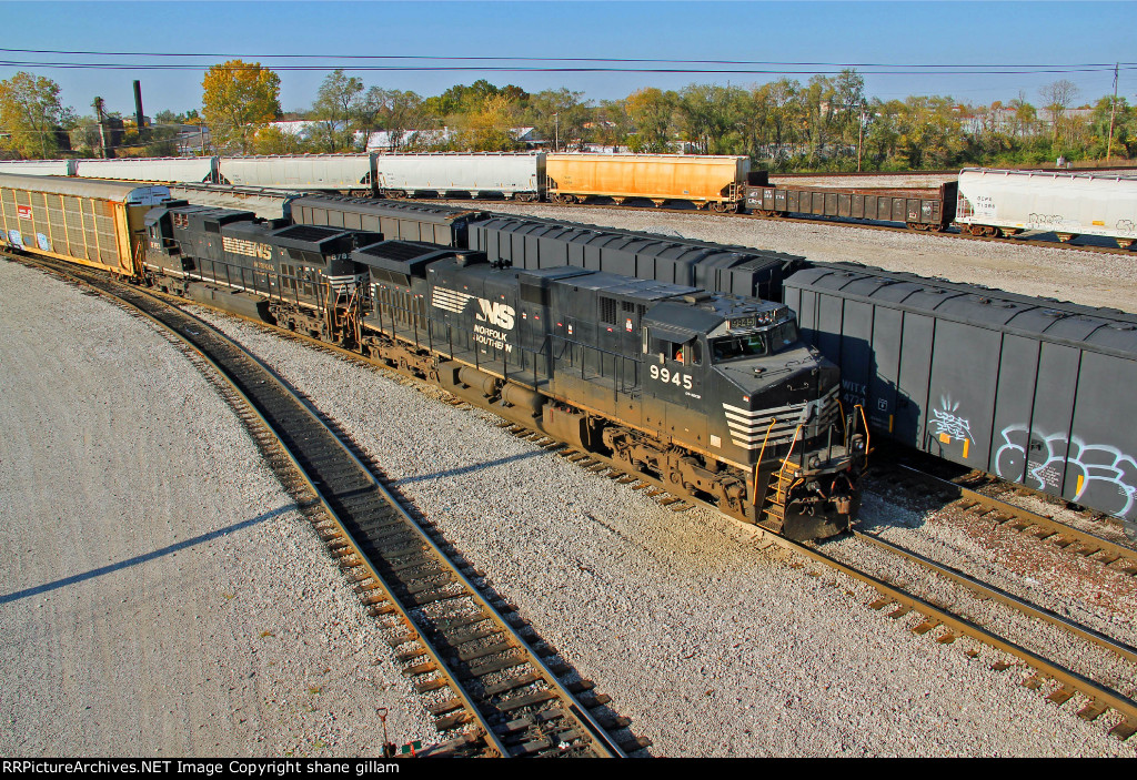 NS 9945 leads a Eb auto train into the Madison Il yard.