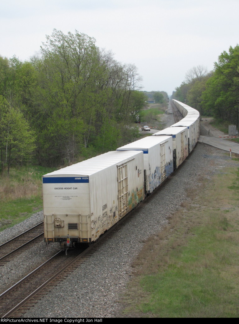 Q090's solid train of reefers heads east