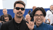 Theo Montoya, director de cine colombiano, junto con el también director vietnamita, Thien An Nguyen, en la 79.ª edición del Festival de Cannes. Foto: Olivier CHASSIGNOLE / AFP