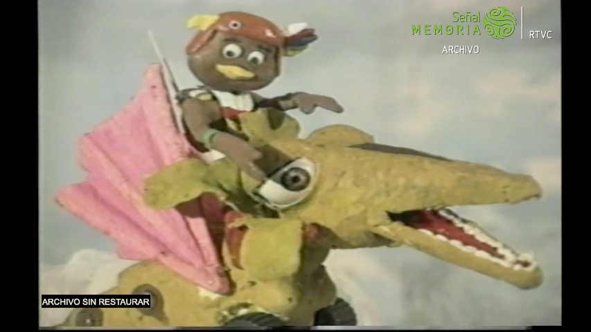 Hurakán el Mensajero y el Dragón Solar. Extraído de: Huertas Motta Andrés (Dirección). Chaparro Madiedo Rafael (Dirección). (1994).  Brújula Mágica [serie] Programa 59. Colombia: Audiovisuales. Archivo Señal Memoria. UMT-211092. 