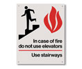 Brooks RP117 Rigid Plastic Directional Sign ”In case of fire...” - 5 1/2" x 7"