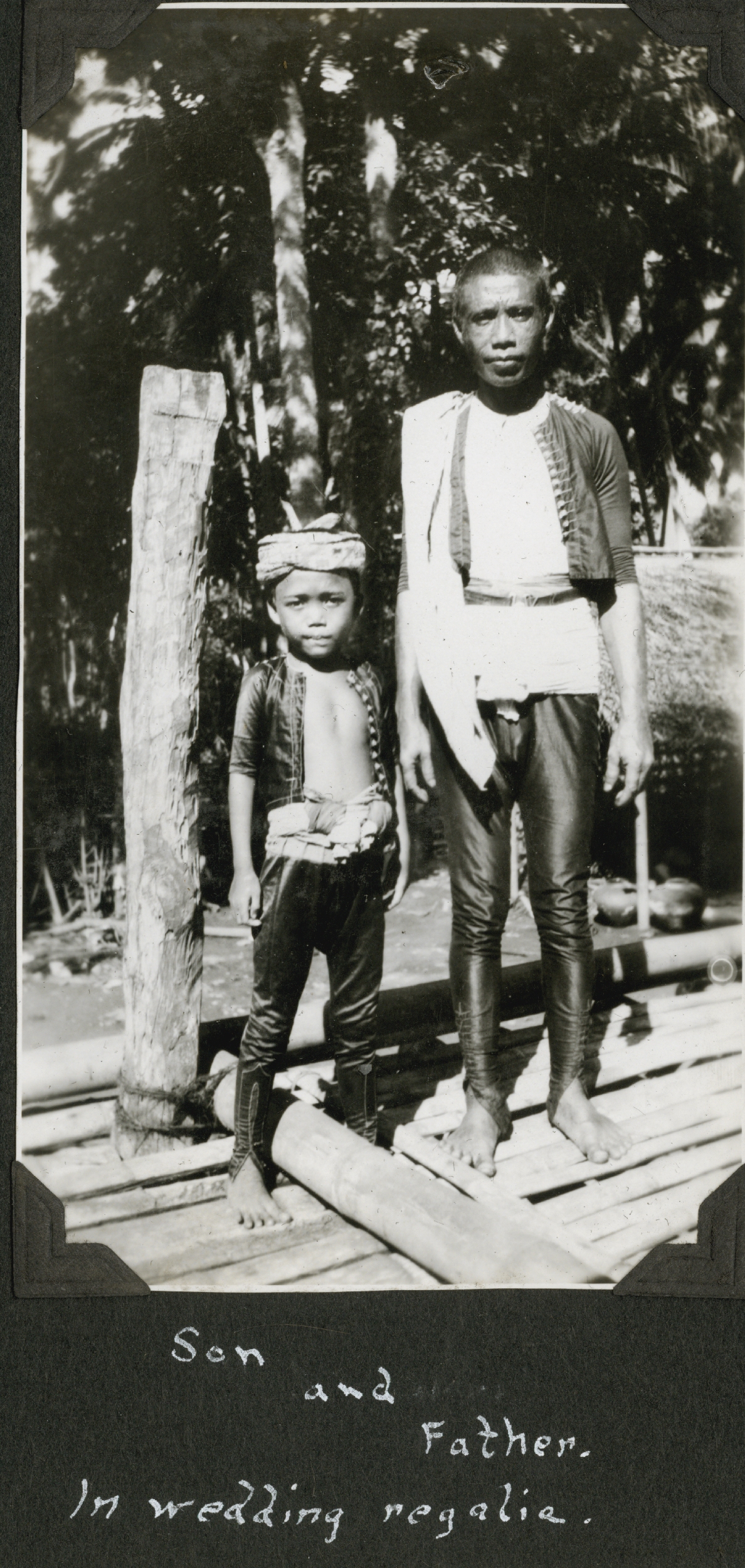 Moro father and son in wedding regalia