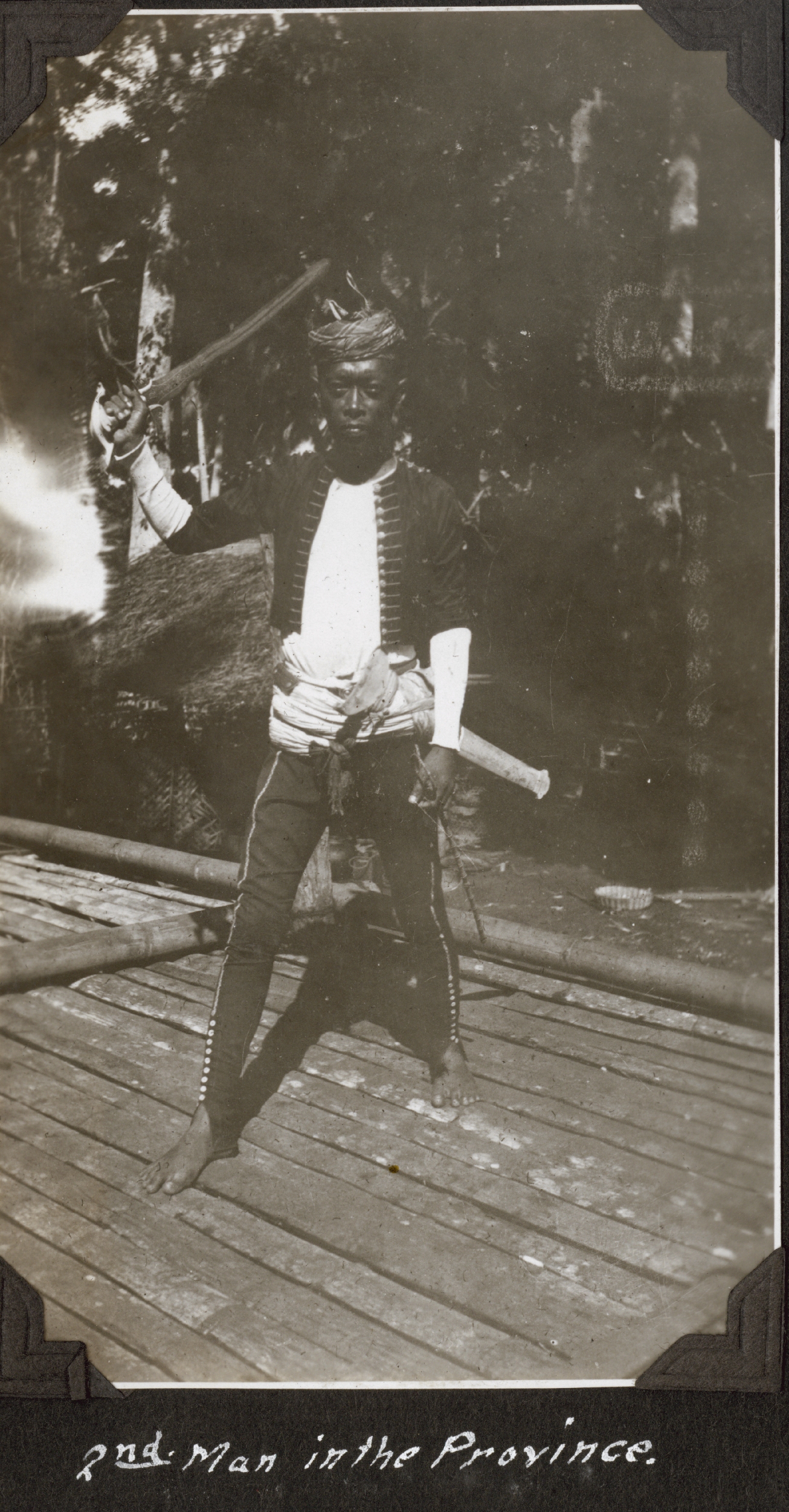 Second man in the province wearing Moro ceremonial dress and displaying a Kris, the traditional Moro sword