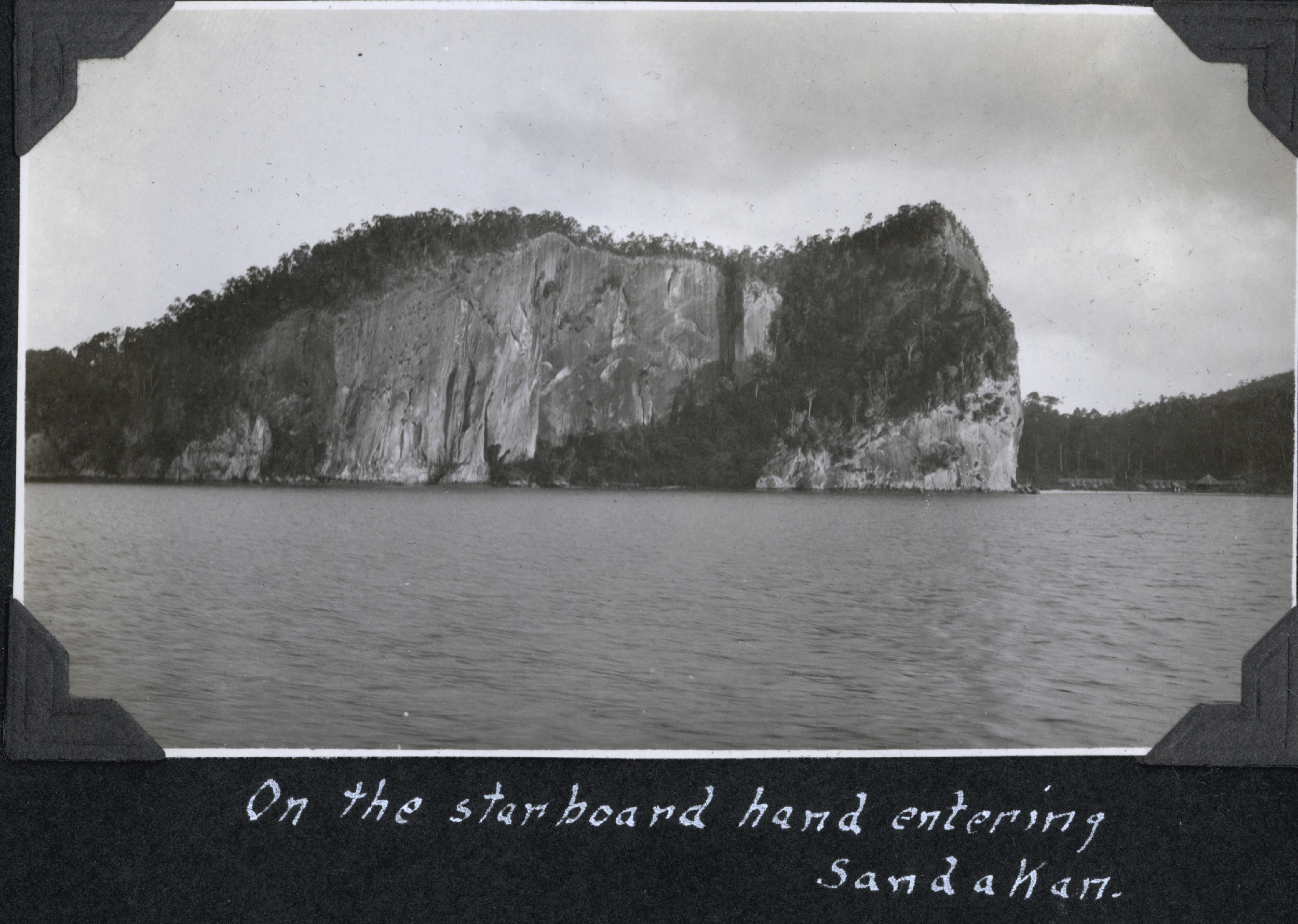 When entering Sandakan Harbor it would seem that it is best to keep this rockon the right hand