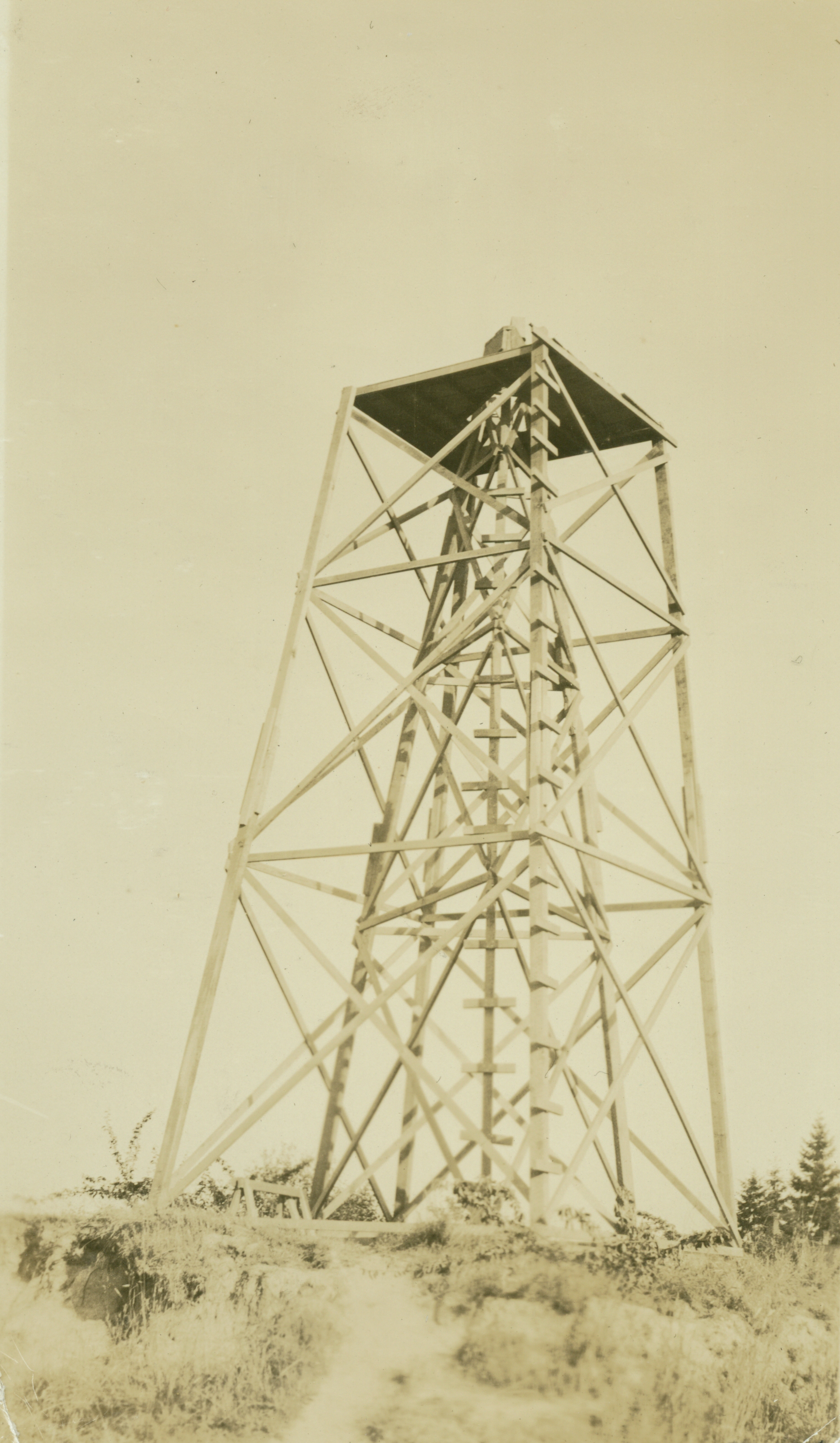 A wooden triangulation tower within a tower