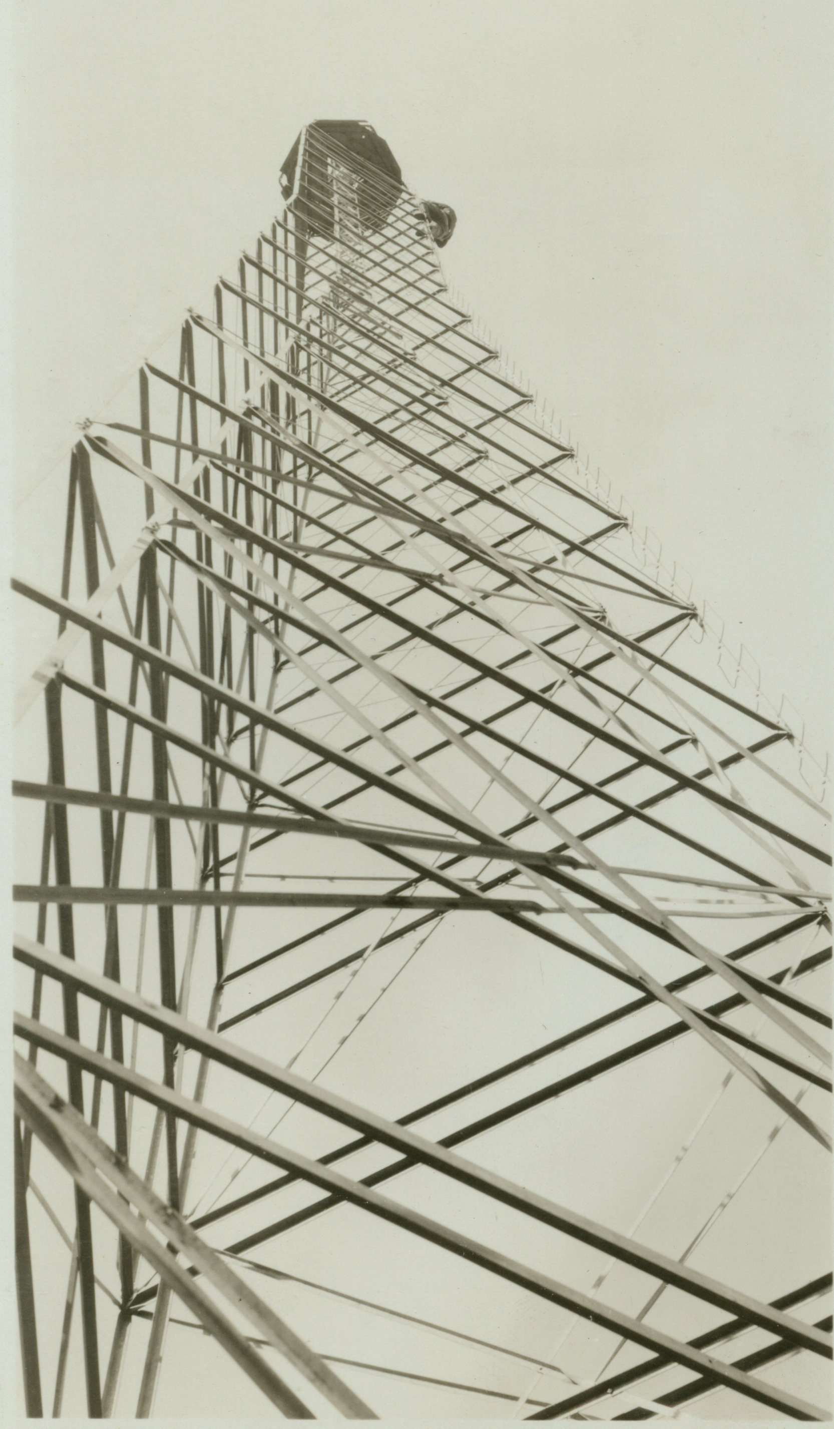 Looking up to the top of a 110-foot Bilby Tower with Bill Kessler on theway up