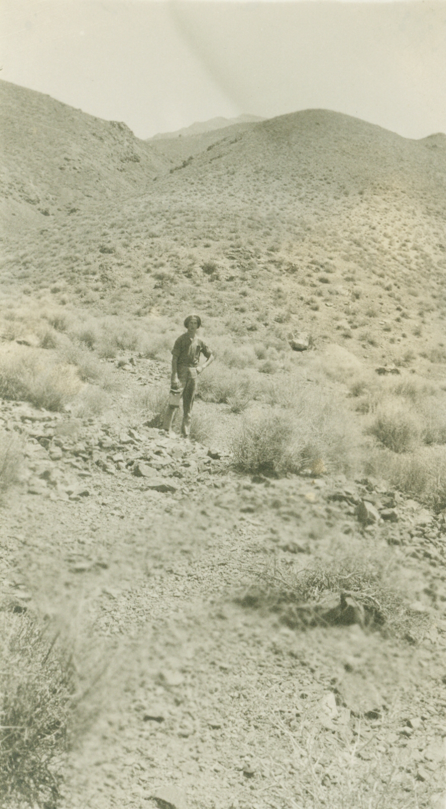 Looking for a mark during leveling operations in the Nevada desert