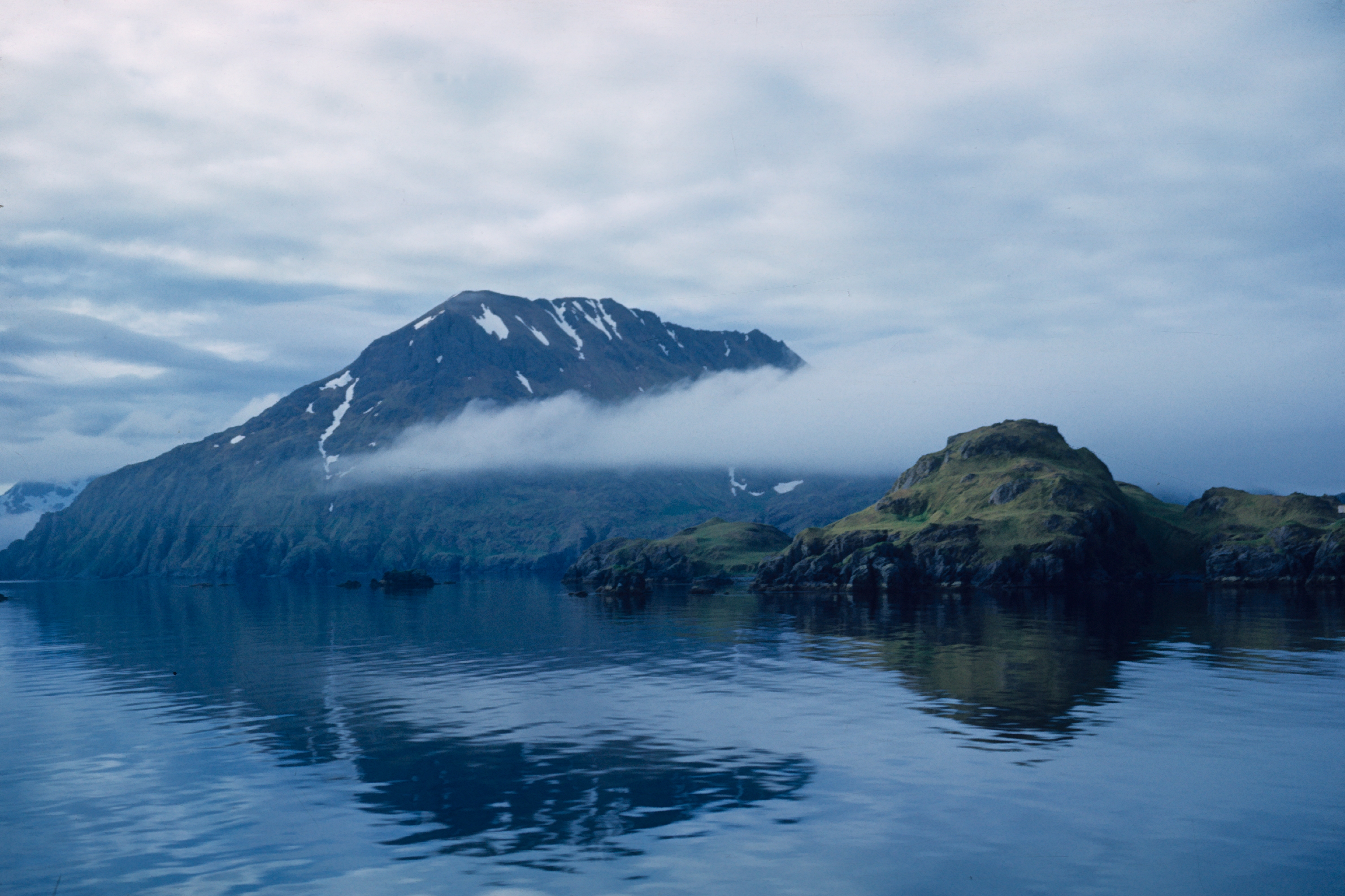 Low clouds and mountains while coming into Adak Harbor