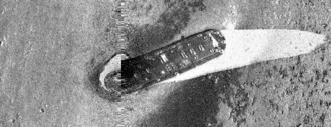 Side Scan sonar image of wreck of oil barge leaking viscous material on seafloor