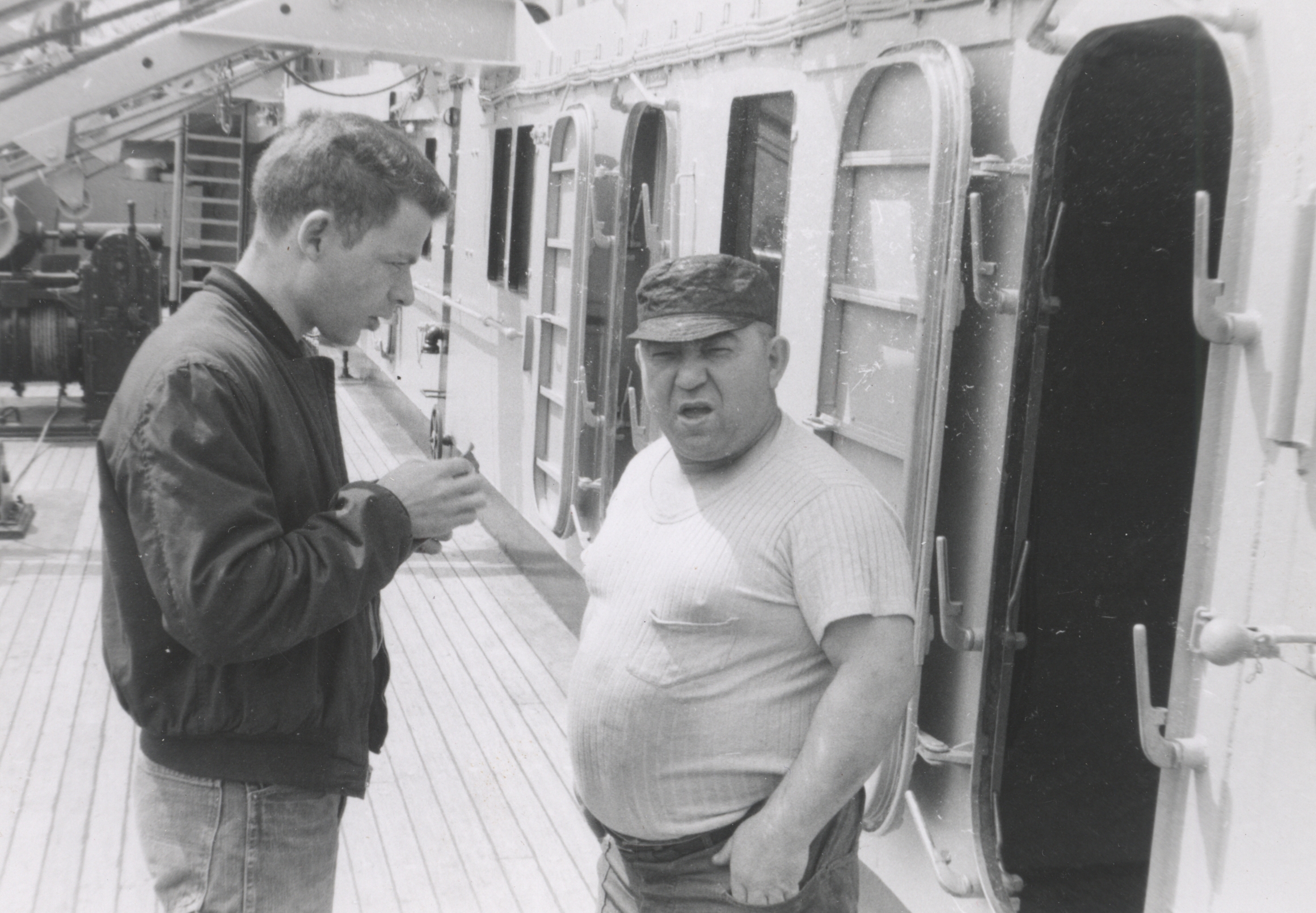 Third Assistant Engineer Tom Garten on left talking to Spud, an oiler on thePATHFINDER