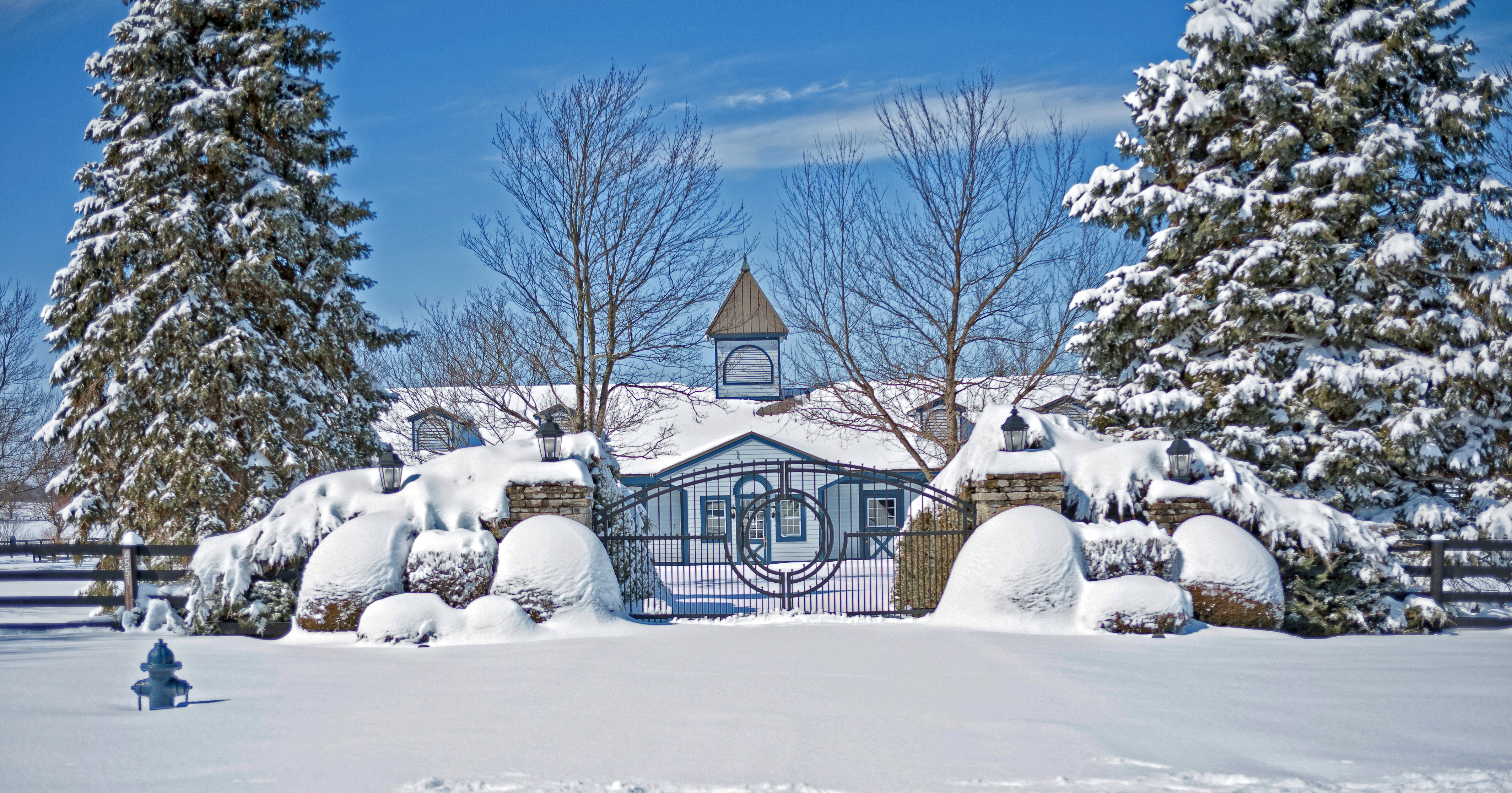 Snow covered horse barn