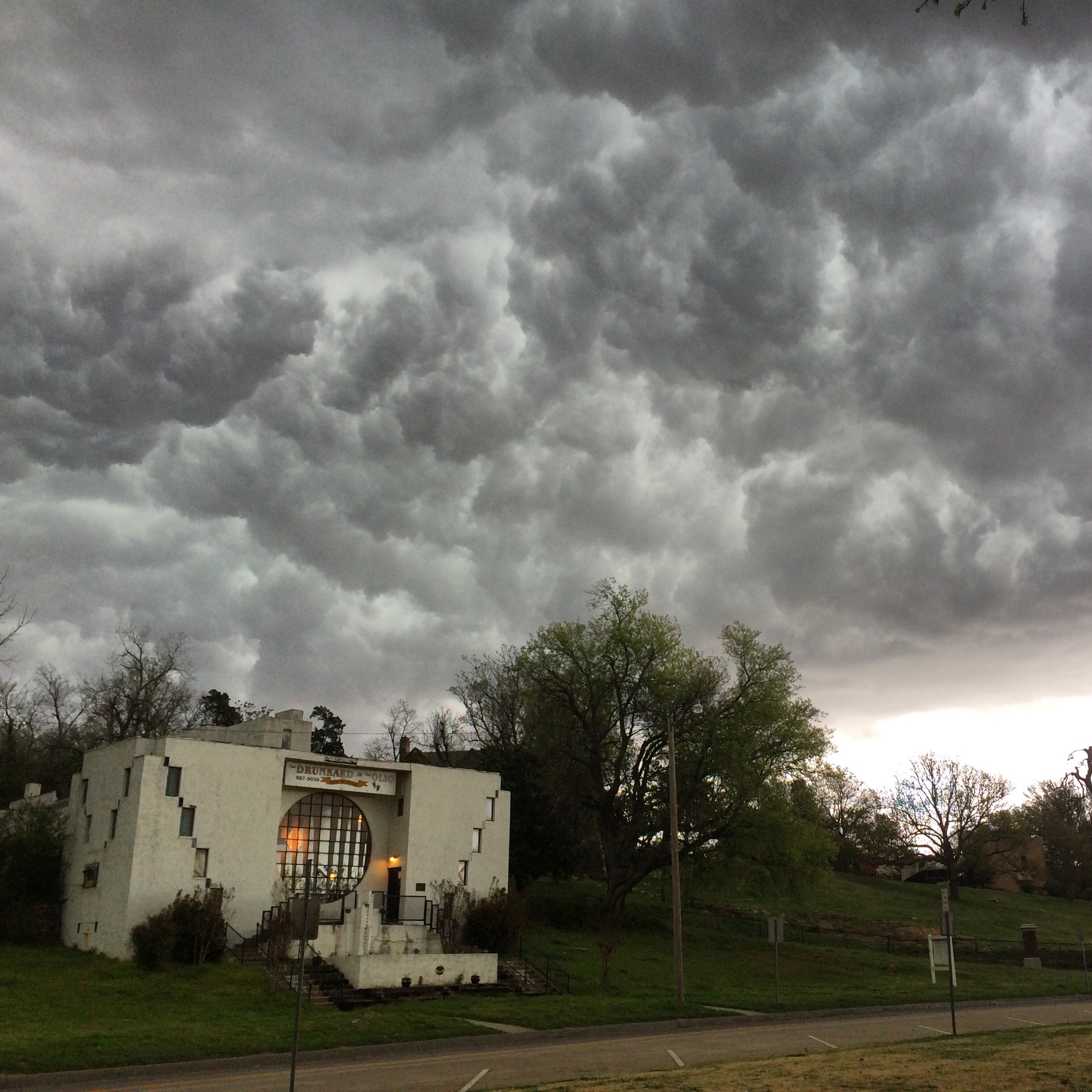 Good Theater - Storm clouds boil over the Spotlight Theater in Tulsa, OK