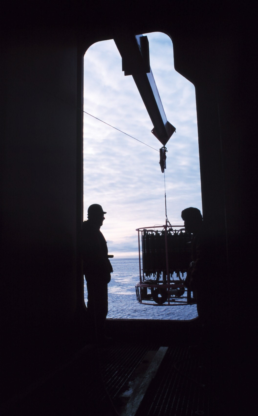 Deploying the Conductivity/Temperture/Depth (CTD) and rosette water samplerthrough the baltic room door of the NATHANIEL B