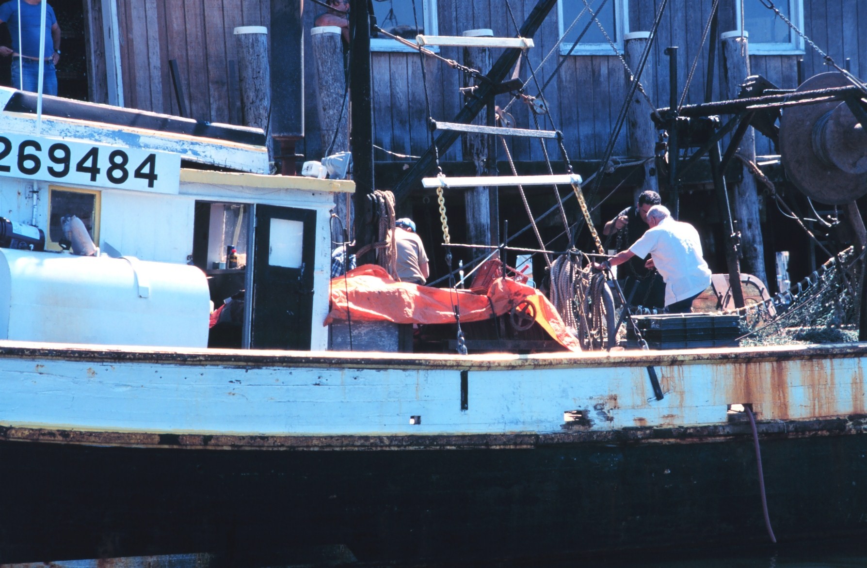 Fishermen mending nets