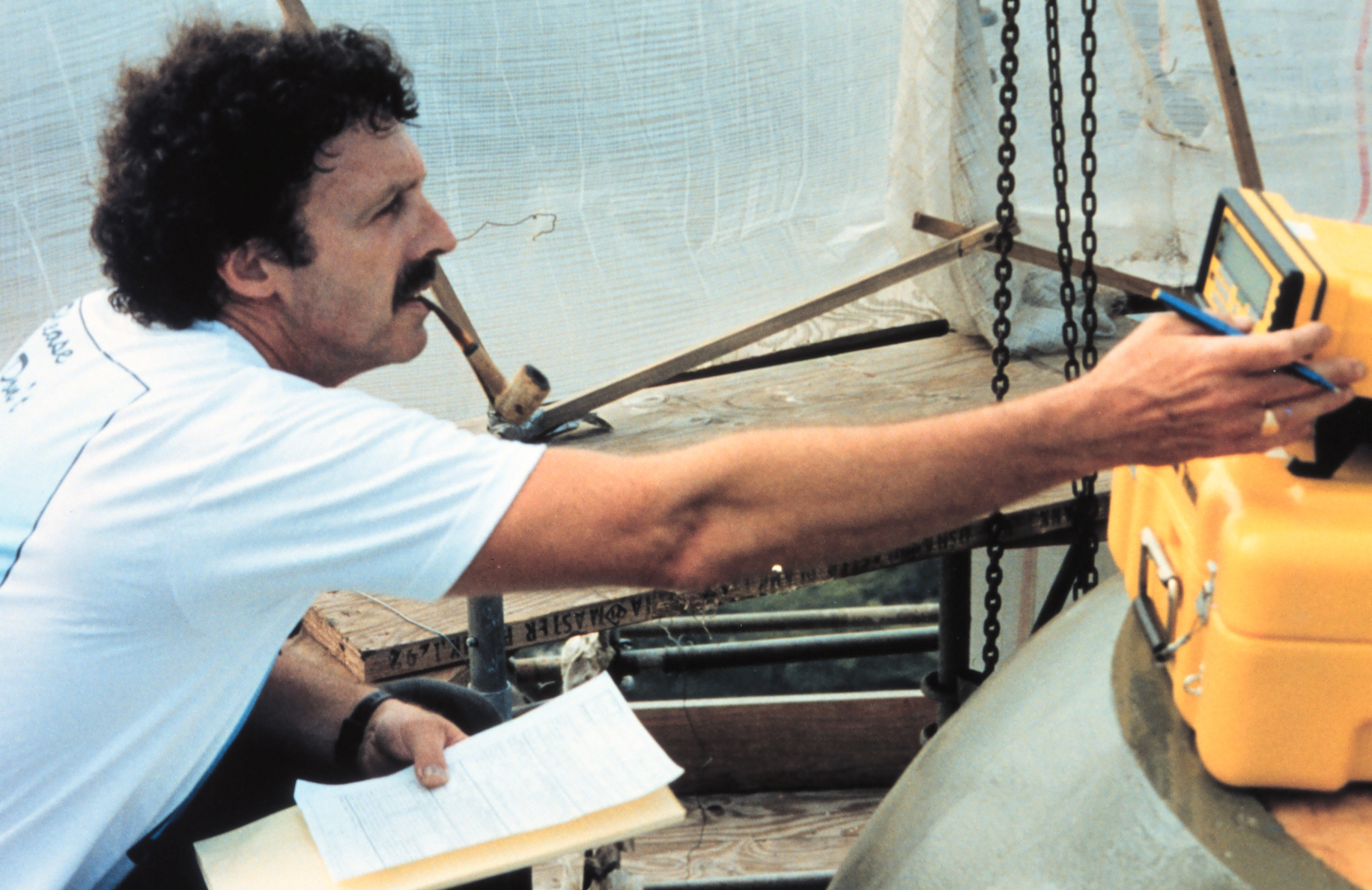 Roy Anderson of the National Geodetic Survey monitoring a GPS receiver atop theCapitol Building