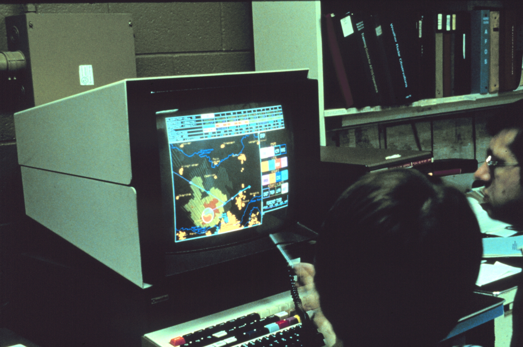 Weather surface forecast office personnel monitoring storm near Oklahoma City