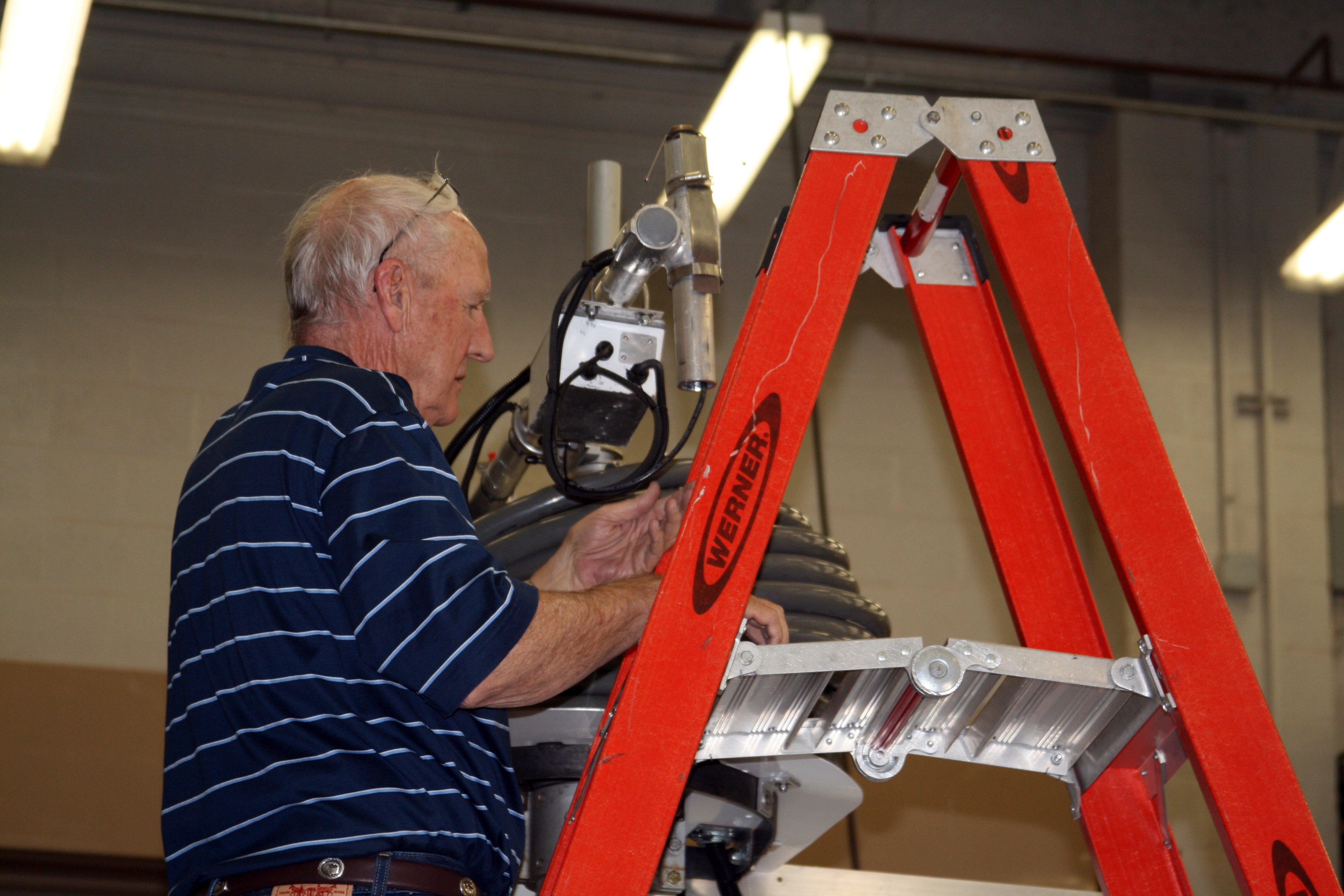 Dennis Nealson working on an anemometer in the NSSL truck bay