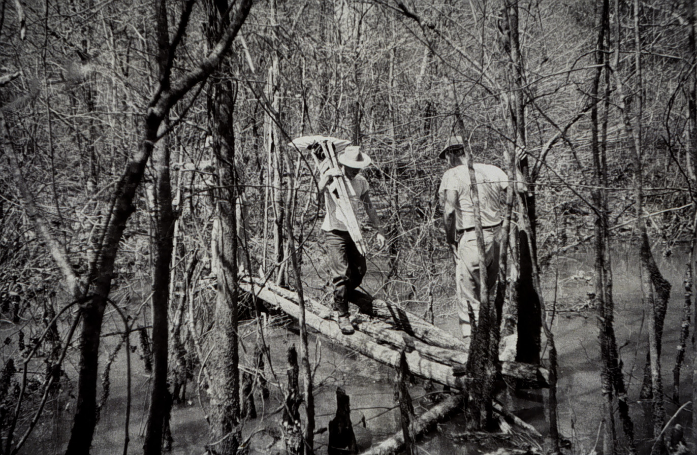 Level party crossing bayous near Dugdemona River